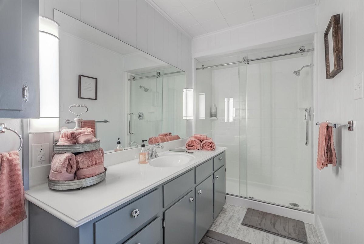 Bathroom, Dual Sink Vanities, Glass Shower, Interior, Wood Texture Flooring