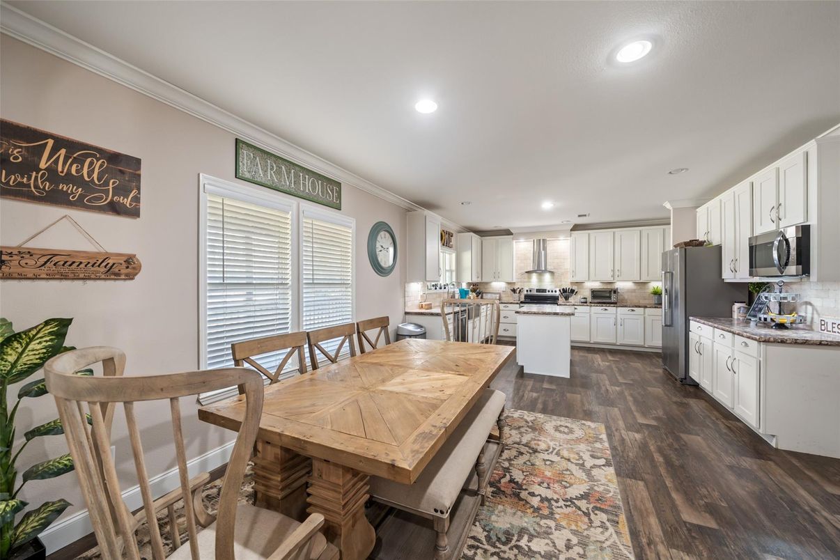 Dining room, Interior, Kitchen, Recessed Lighting, Stainless Steel Appliances, Wood Texture Flooring
