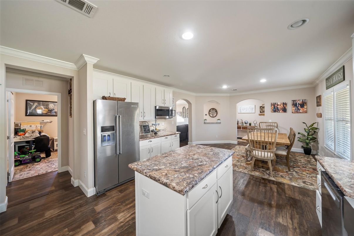 Dining room, Interior, Kitchen, Recessed Lighting, Stainless Steel Appliances, Wood Texture Flooring