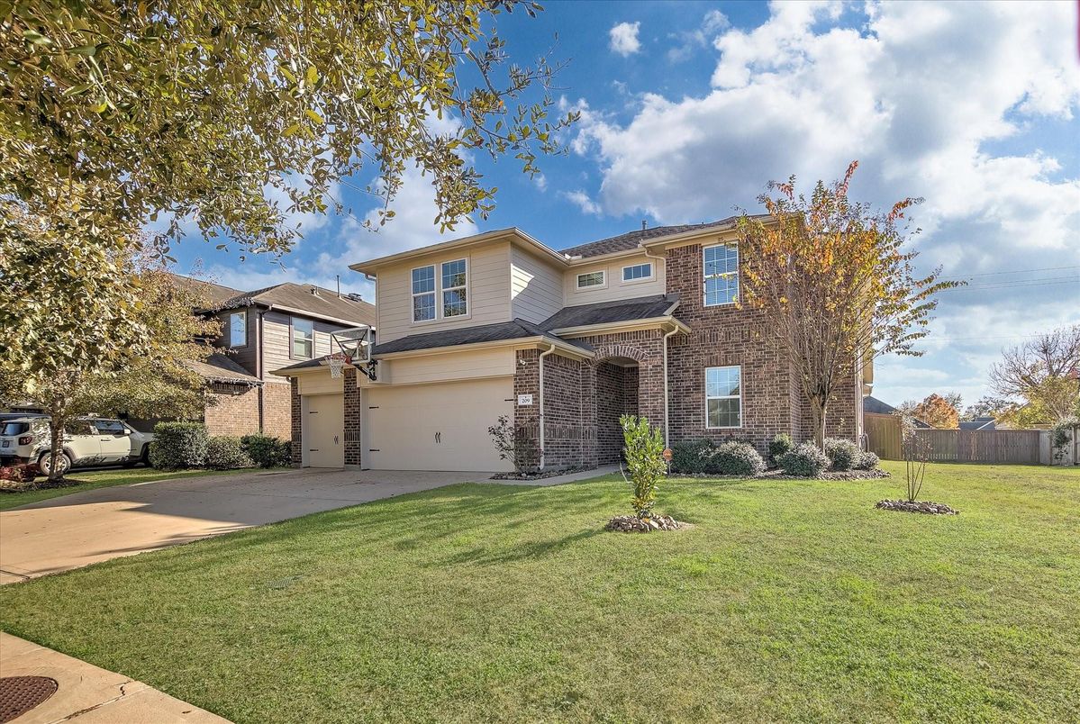 Attached, Exterior, Facade, Brick Facade, Mediterranean