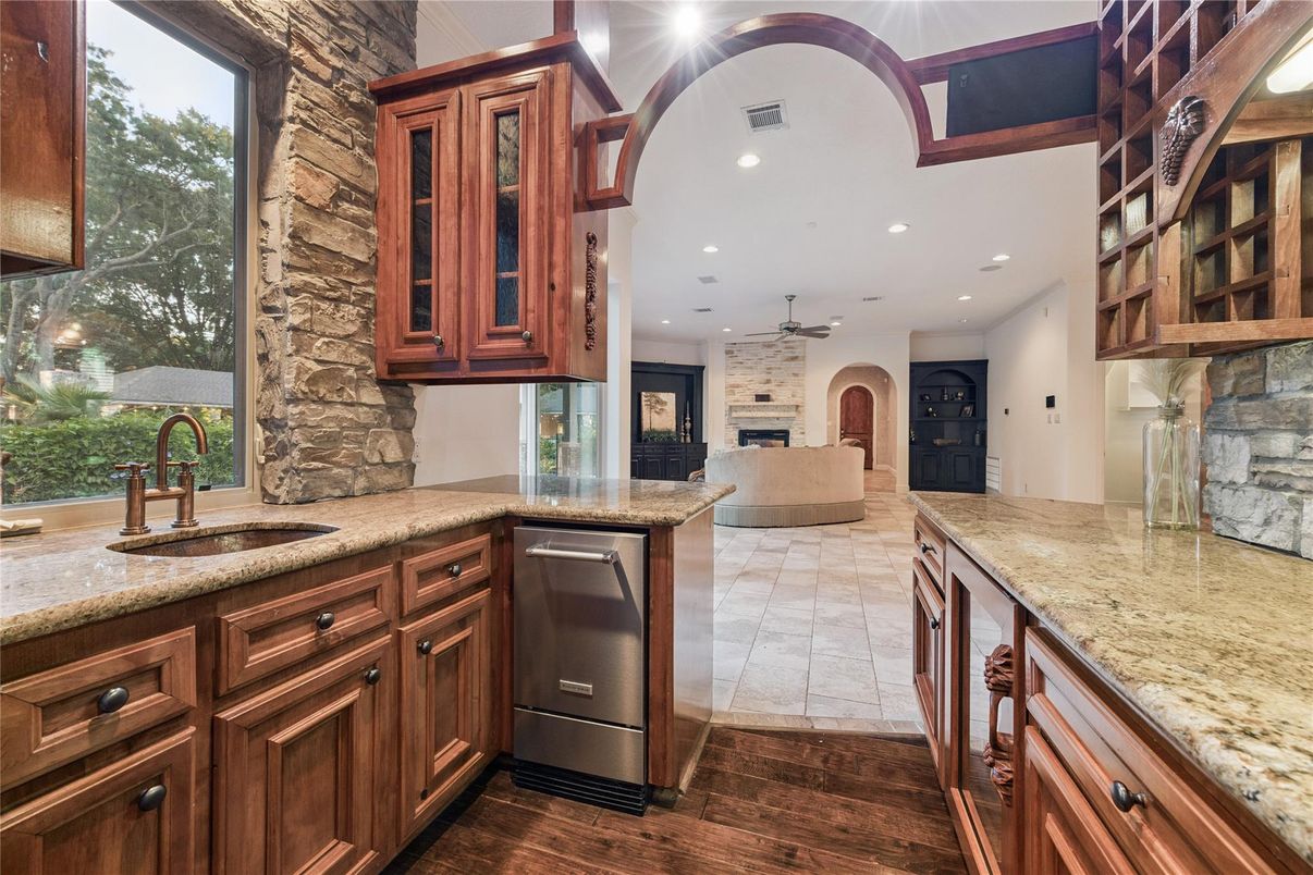 Fireplace, Interior, Kitchen, Recessed Lighting, Stone Walls, Wood Texture Flooring