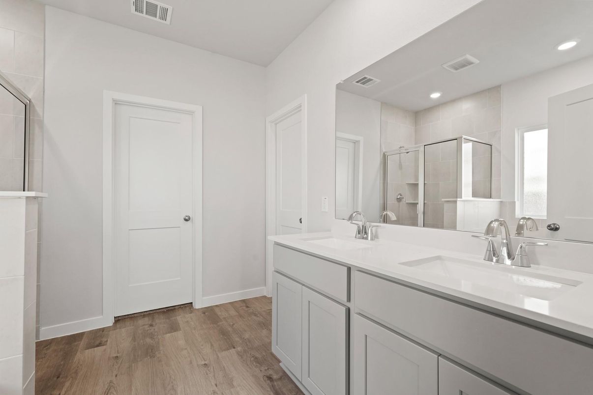 Bathroom, Dual Sink Vanities, Glass Shower, Interior, Recessed Lighting, Wood Texture Flooring