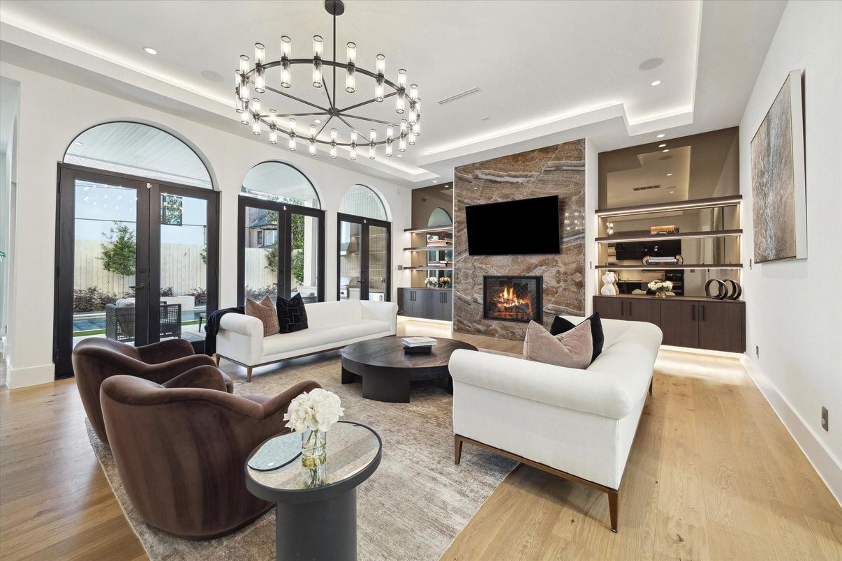 Fireplace, Interior, Living room, Pendant Lights, Recessed Lighting, Stone Walls, Wood Texture Flooring