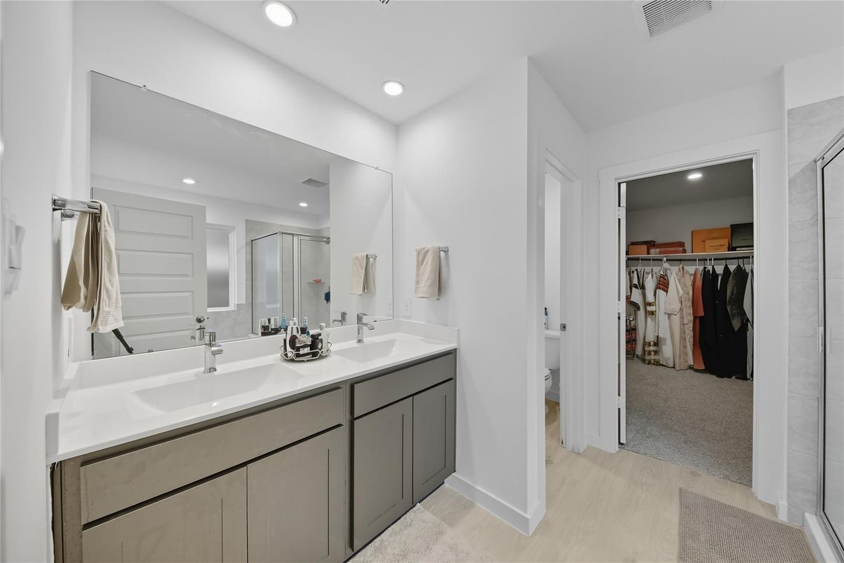 Bathroom, Dual Sink Vanities, Interior, Recessed Lighting, Walk-in Closets