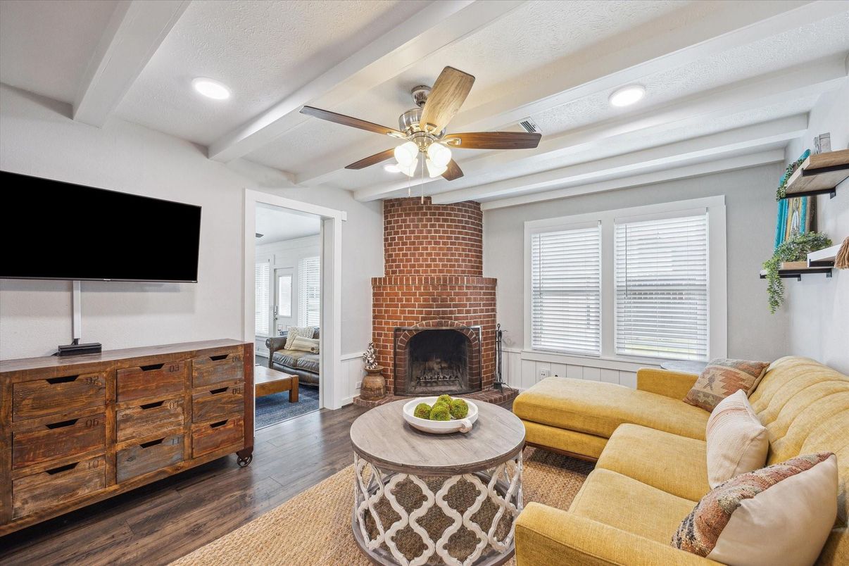 Fireplace, Interior, Living room, Recessed Lighting, Stone Walls, Wood Texture Flooring