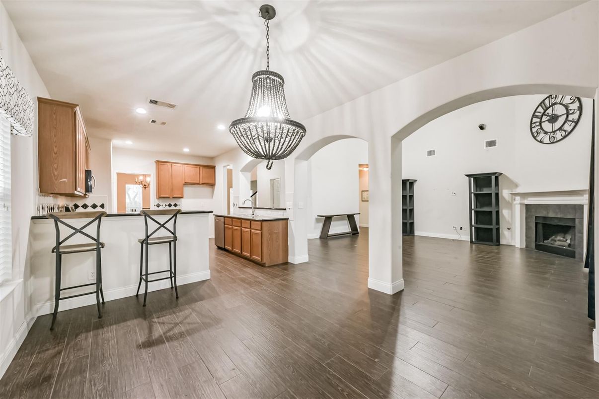 Chandelier, Fireplace, Interior, Kitchen, Pendant Lights, Recessed Lighting, Wood Texture Flooring