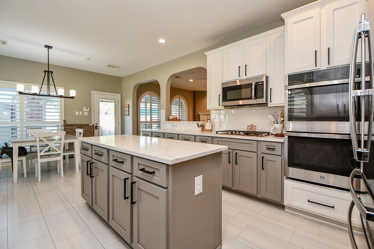 Chandelier, Dining room, Interior, Kitchen, Pendant Lights, Recessed Lighting, Stainless Steel Appliances