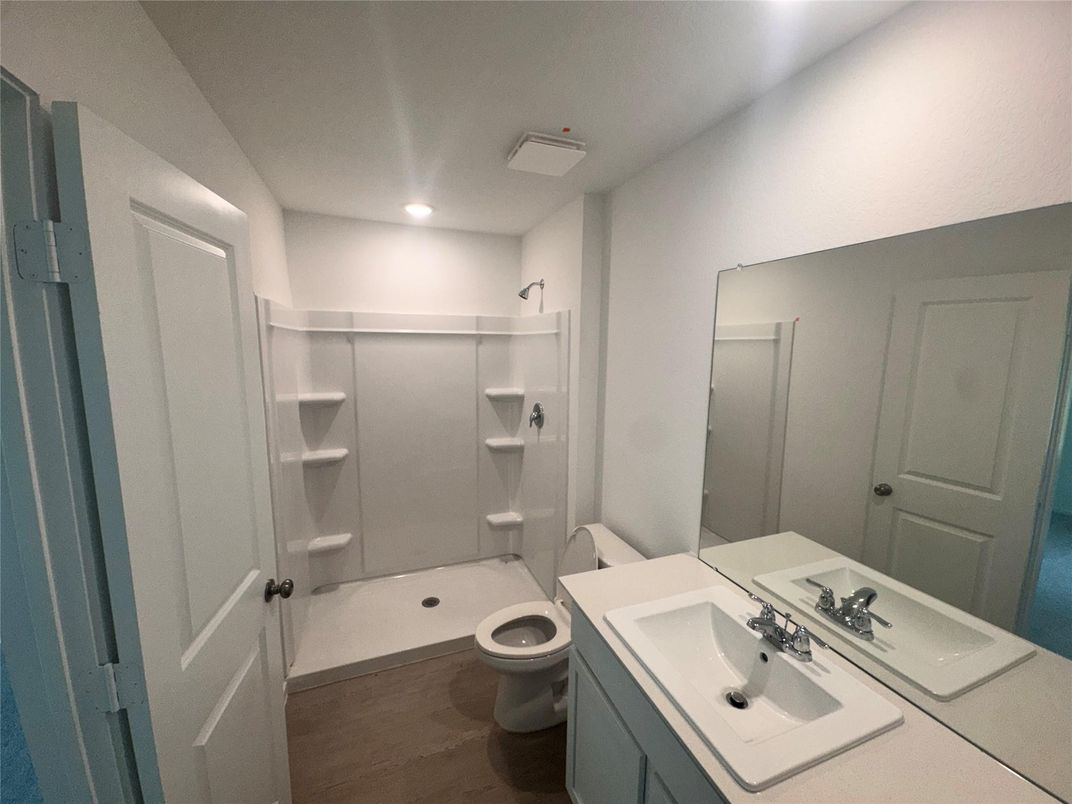 Bathroom, Dual Sink Vanities, Interior, Recessed Lighting, Wood Texture Flooring