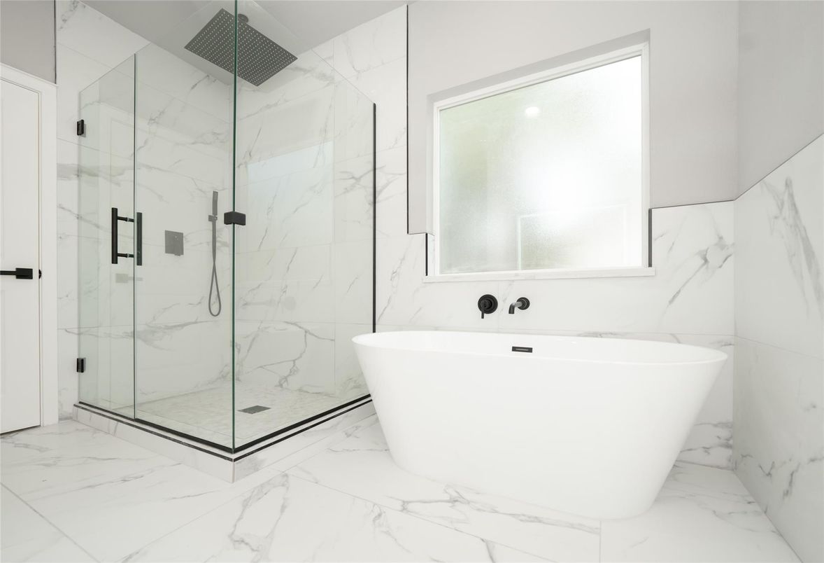 Bathroom, Free Standing Baths, Glass Shower, Interior, Marble, Marble Walls, Recessed Lighting