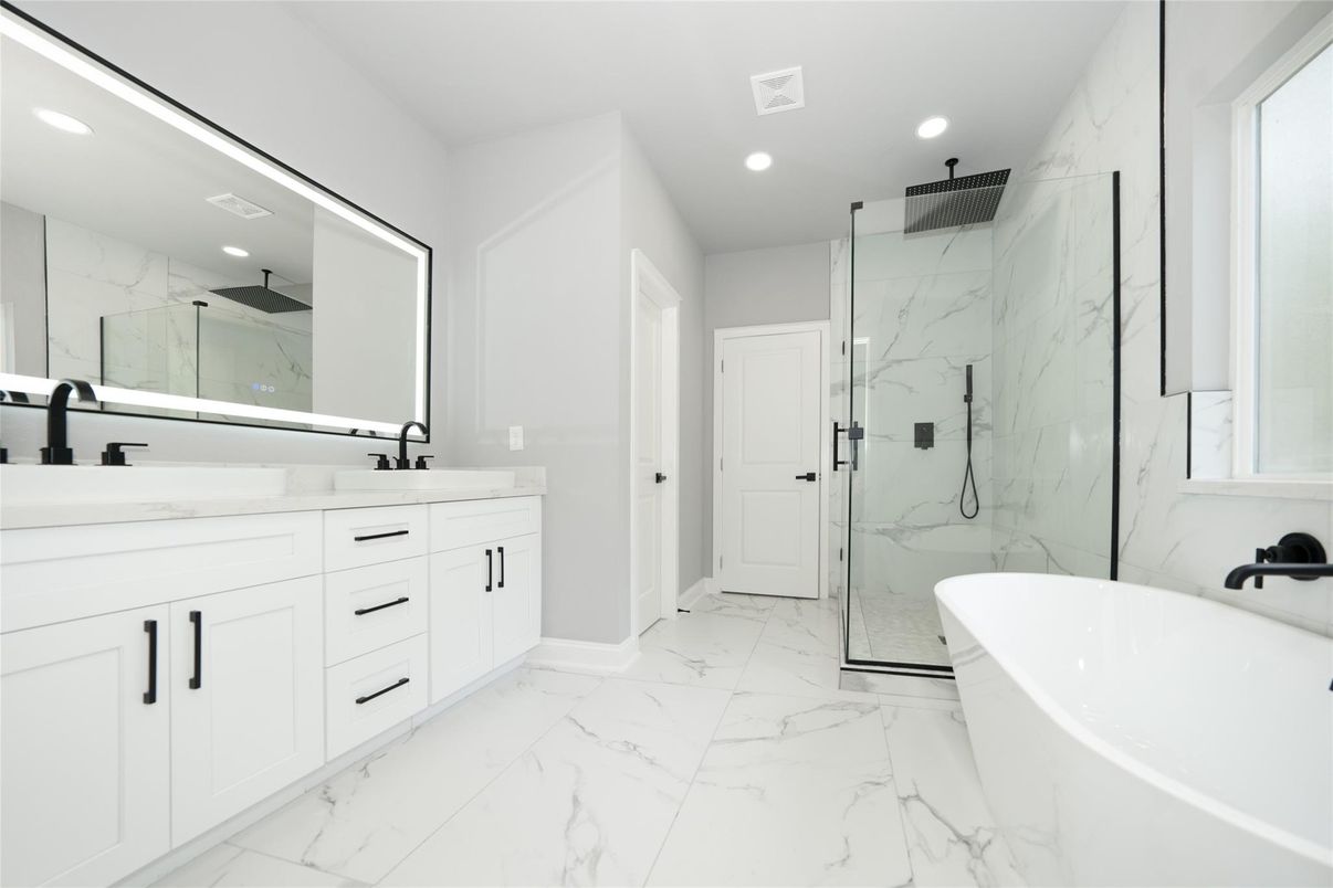 Bathroom, Dual Sink Vanities, Free Standing Baths, Glass Shower, Interior, Marble, Marble Walls, Recessed Lighting