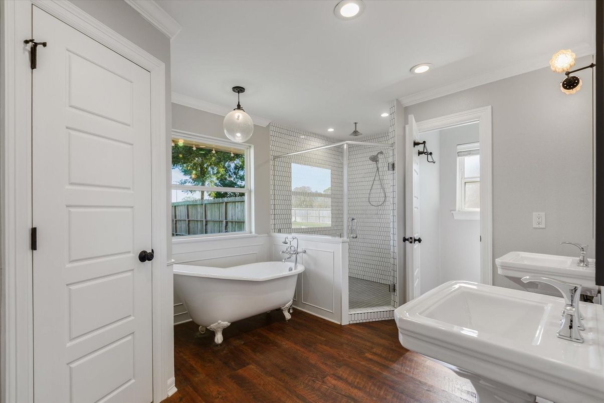 Bathroom, Free Standing Baths, Glass Shower, Interior, Pendant Lights, Recessed Lighting, Wood Texture Flooring