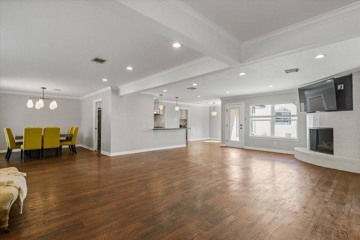 Dining room, Fireplace, Interior, Pendant Lights, Recessed Lighting, Wood Texture Flooring