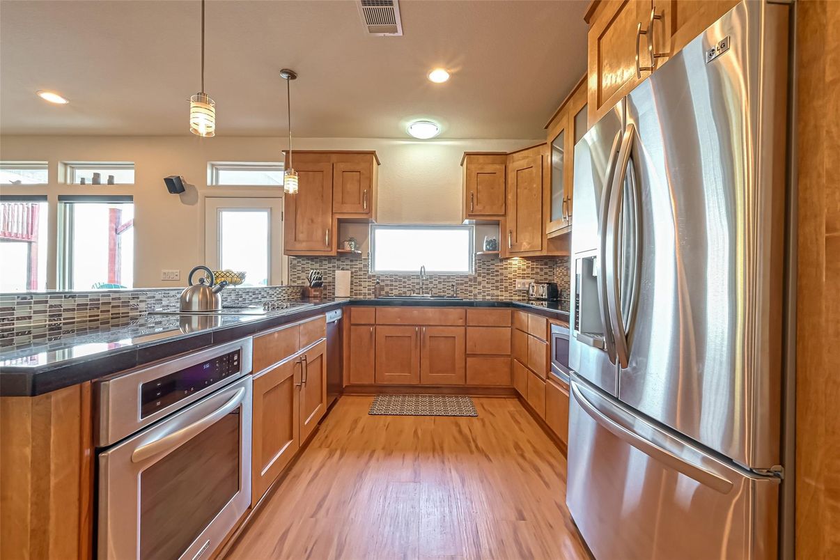 Interior, Kitchen, Pendant Lights, Recessed Lighting, Stainless Steel Appliances, Wood Texture Flooring