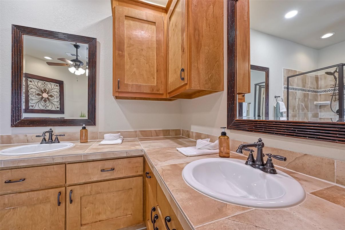 Bathroom, Dual Sink Vanities, Interior, Recessed Lighting, Tile Countertops