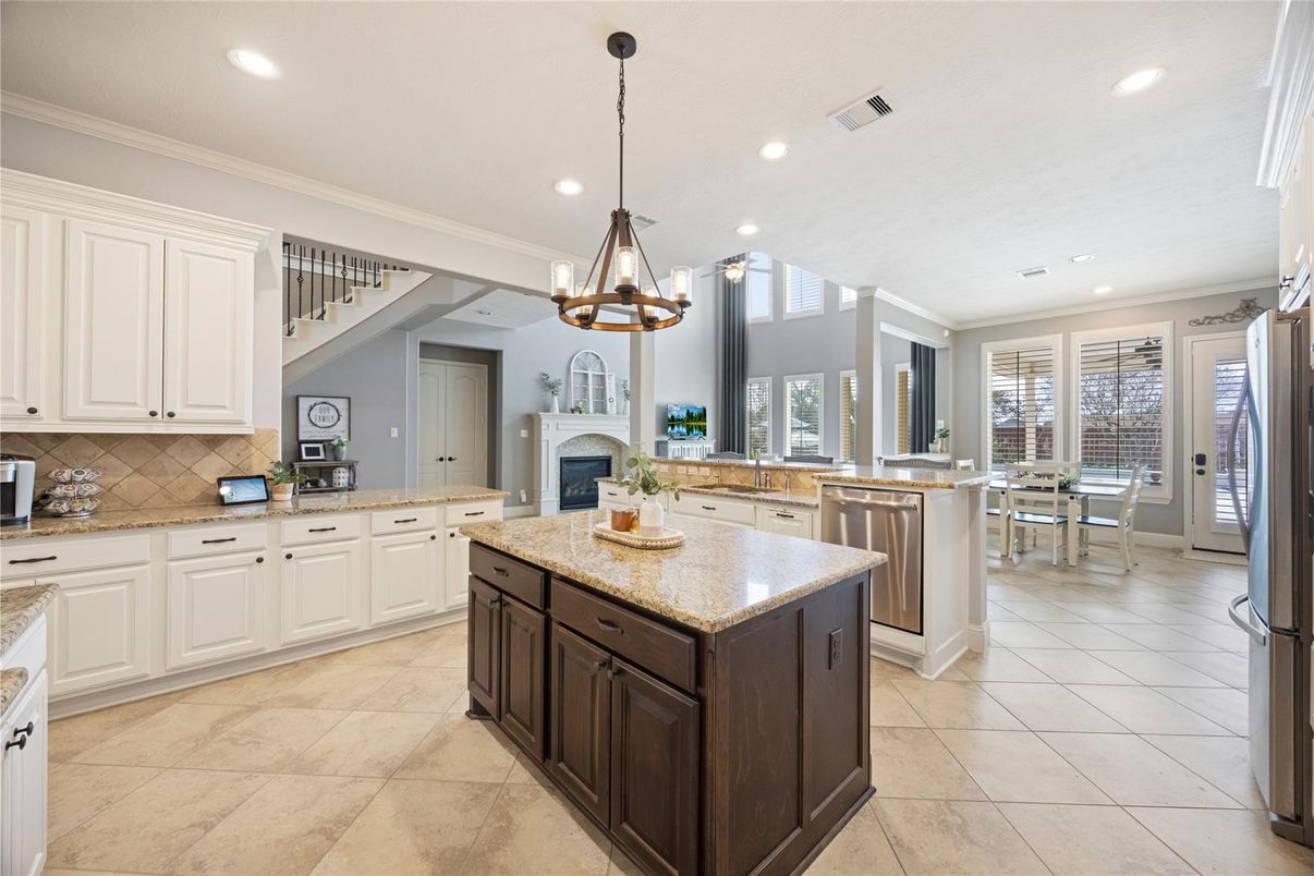 Dining room, Fireplace, Interior, Kitchen, Pendant Lights, Recessed Lighting, Stainless Steel Appliances