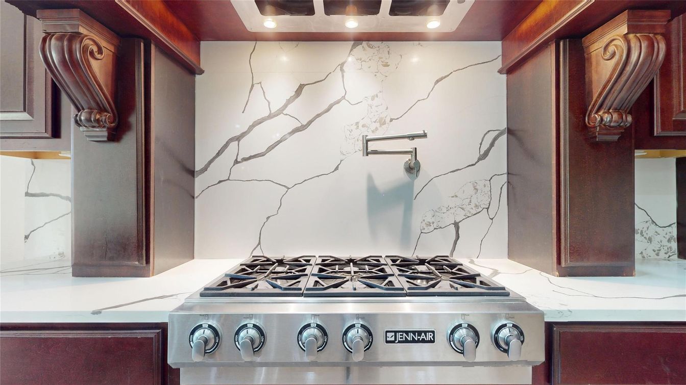 Interior, Kitchen, Marble Walls, Recessed Lighting, Stainless Steel Appliances