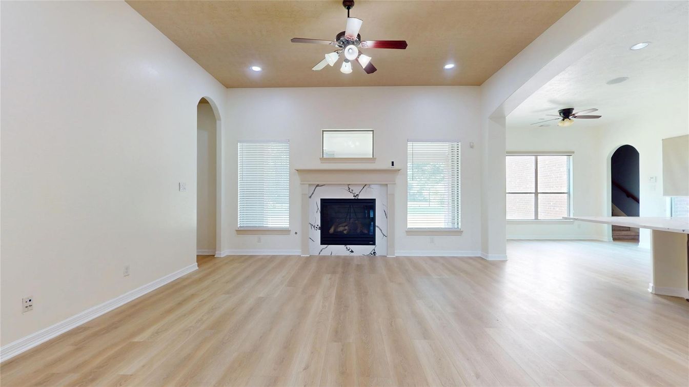 Empty room, Fireplace, Interior, Recessed Lighting, Wood Texture Flooring