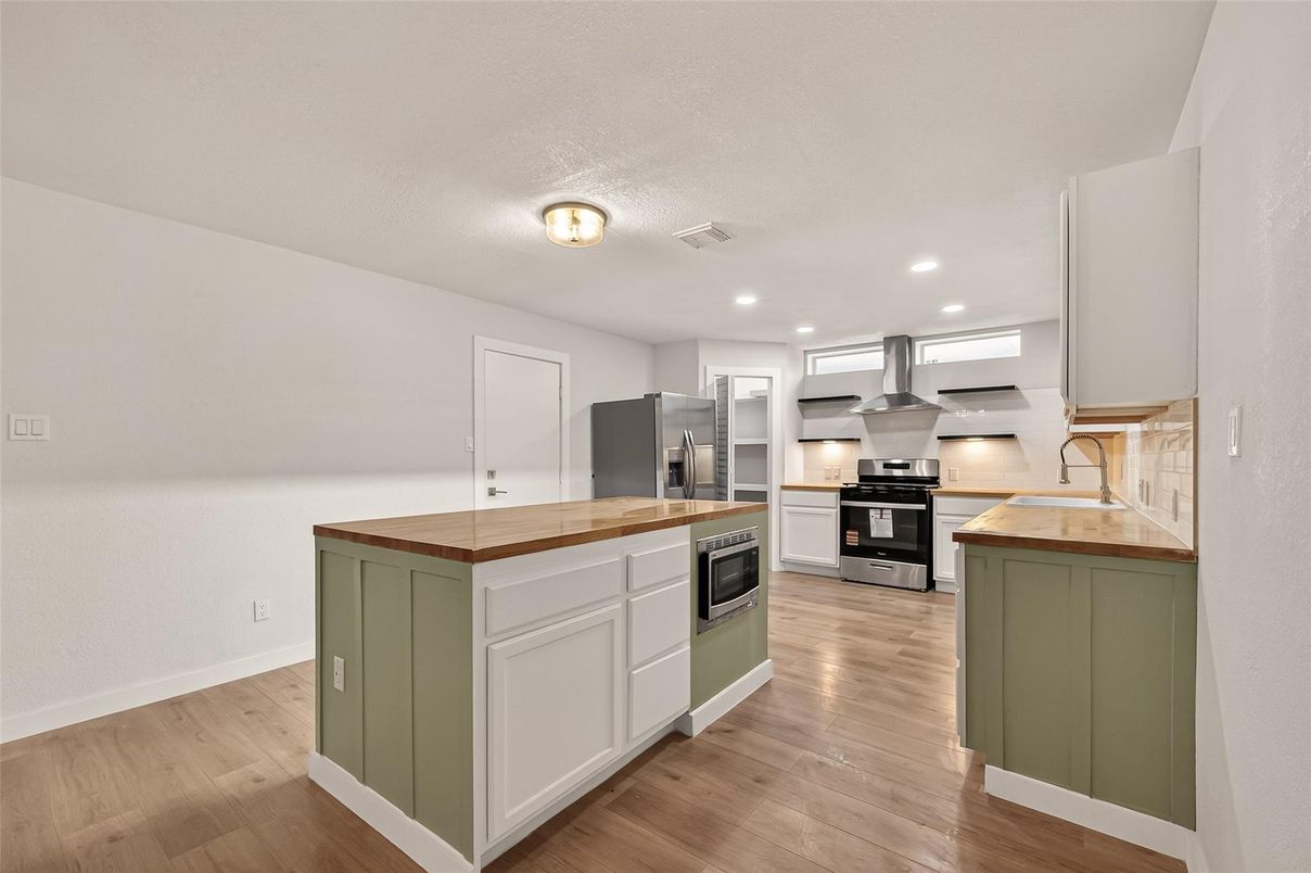 Interior, Kitchen, Recessed Lighting, Stainless Steel Appliances, Wood Texture Flooring