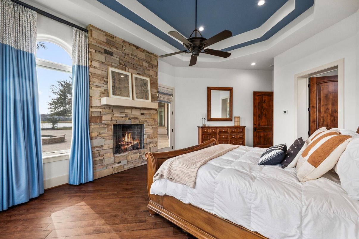 Bedroom, Fireplace, Interior, Recessed Lighting, Stone Walls, Wood Texture Flooring
