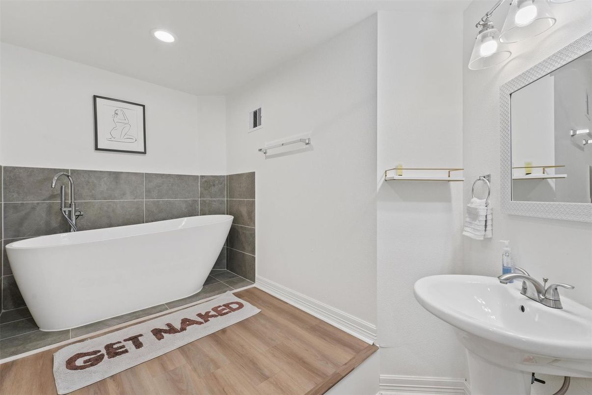 Bathroom, Free Standing Baths, Interior, Recessed Lighting, Wood Texture Flooring