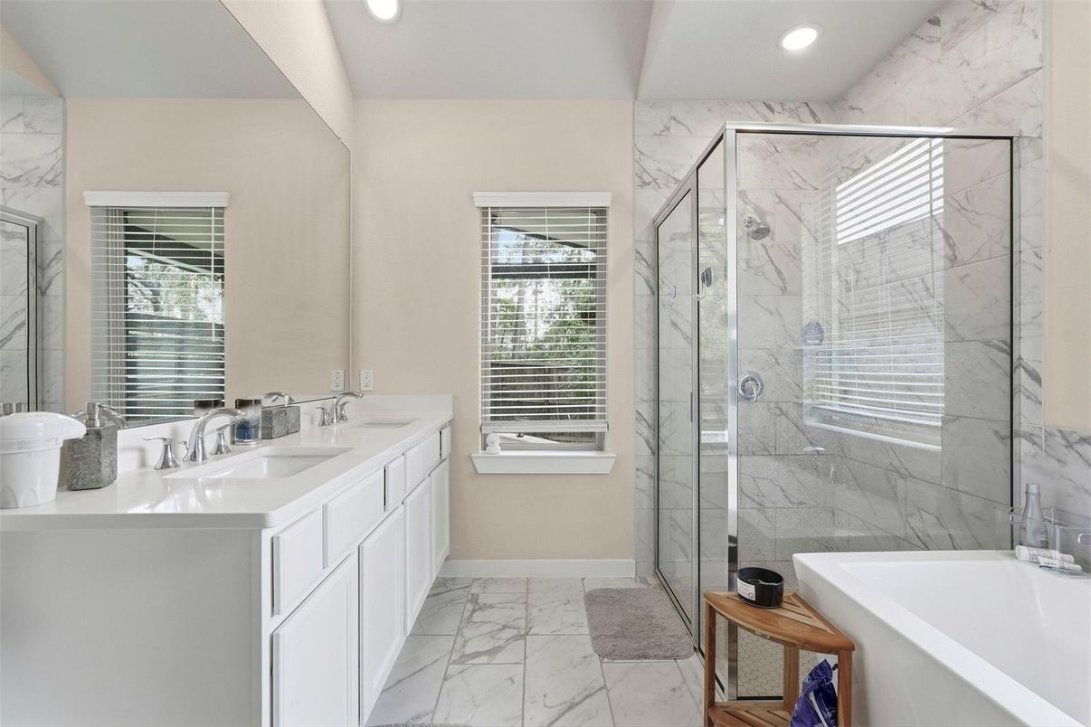 Bathroom, Dual Sink Vanities, Glass Shower, Interior, Marble, Marble Walls, Recessed Lighting