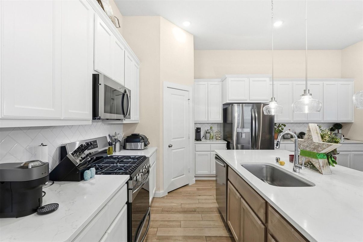 Interior, Kitchen, Pendant Lights, Recessed Lighting, Stainless Steel Appliances, Wood Texture Flooring
