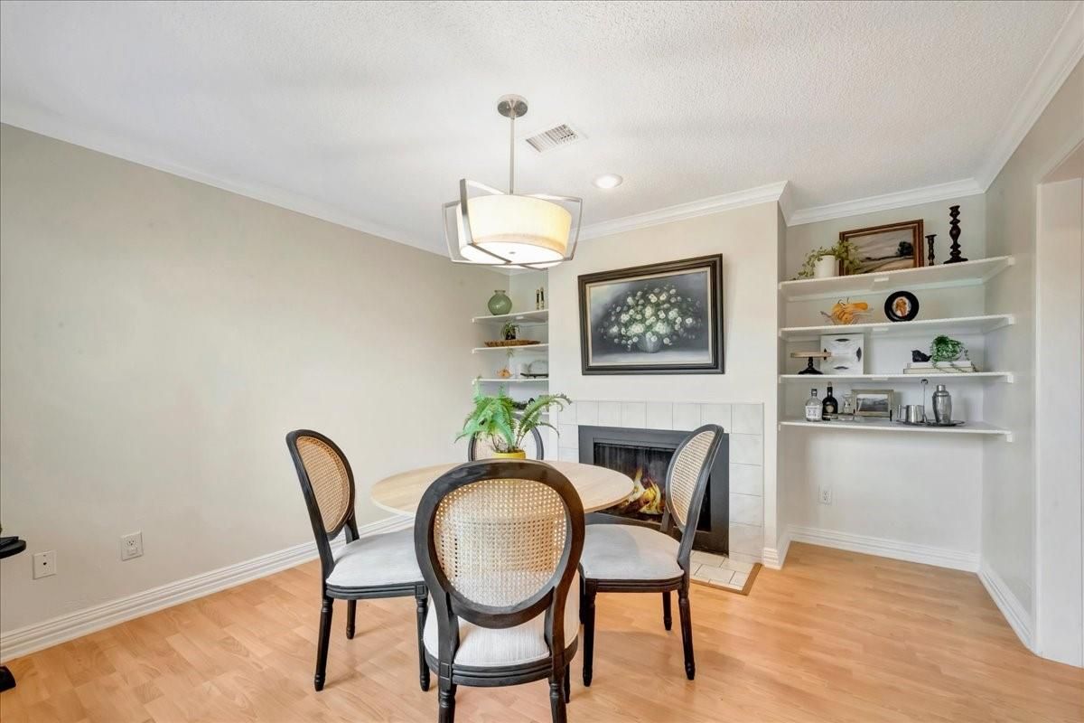 Dining room, Fireplace, Interior, Pendant Lights, Recessed Lighting, Wood Texture Flooring