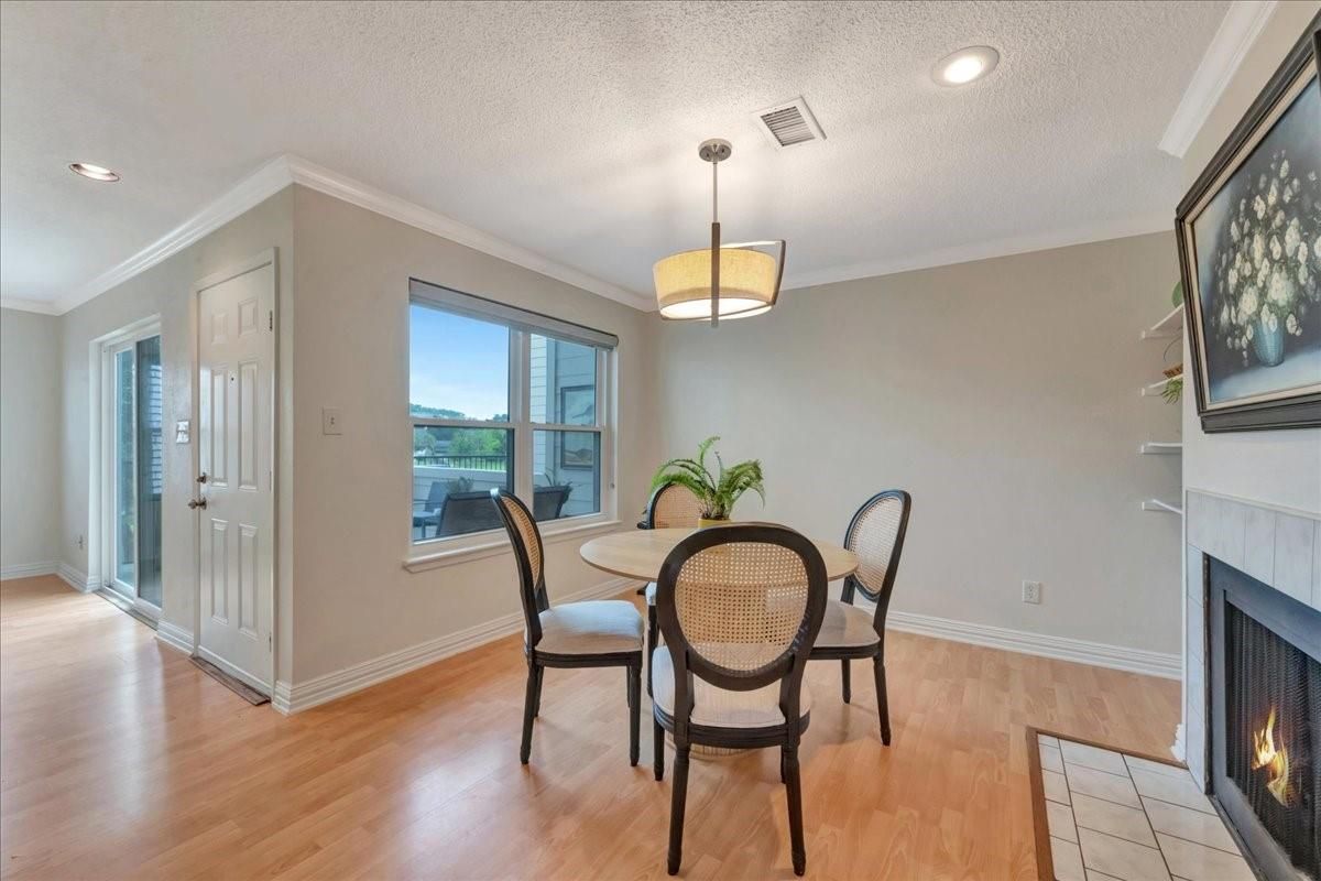Dining room, Fireplace, Interior, Pendant Lights, Recessed Lighting, Wood Texture Flooring
