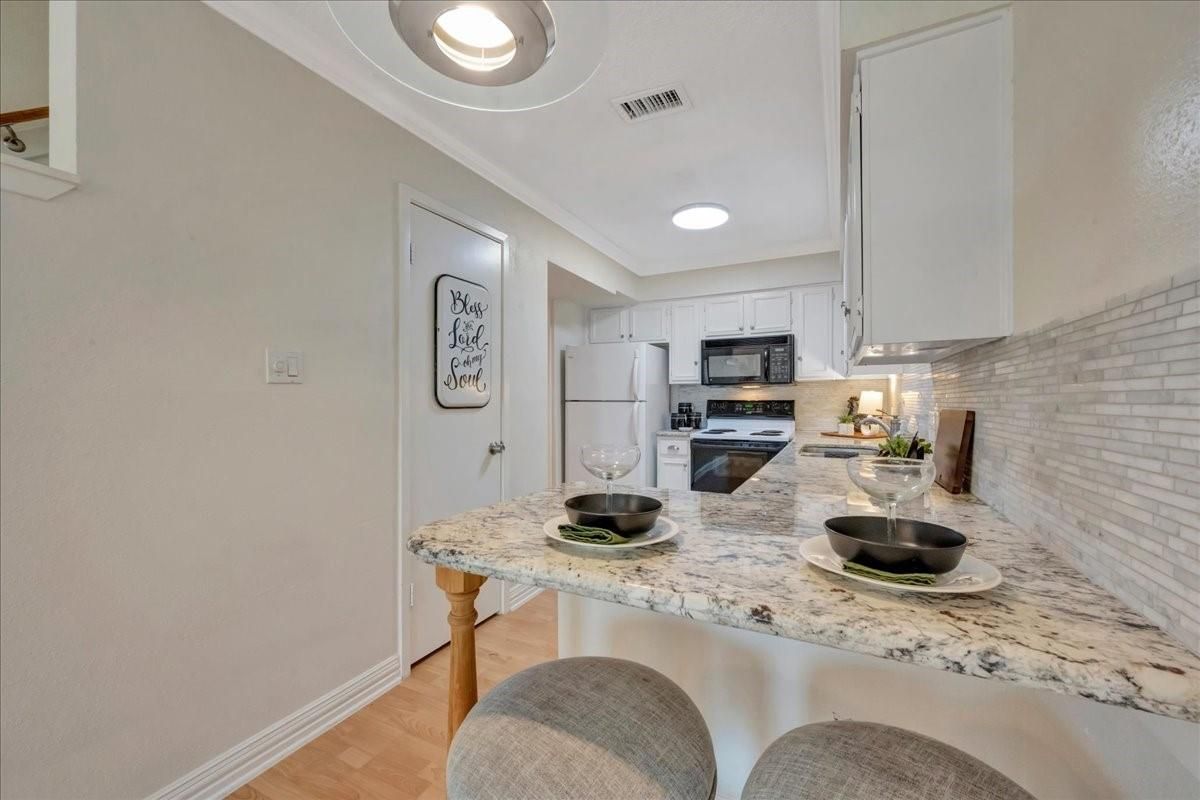 Interior, Kitchen, Recessed Lighting, Stainless Steel Appliances, Stone Walls, Wood Texture Flooring