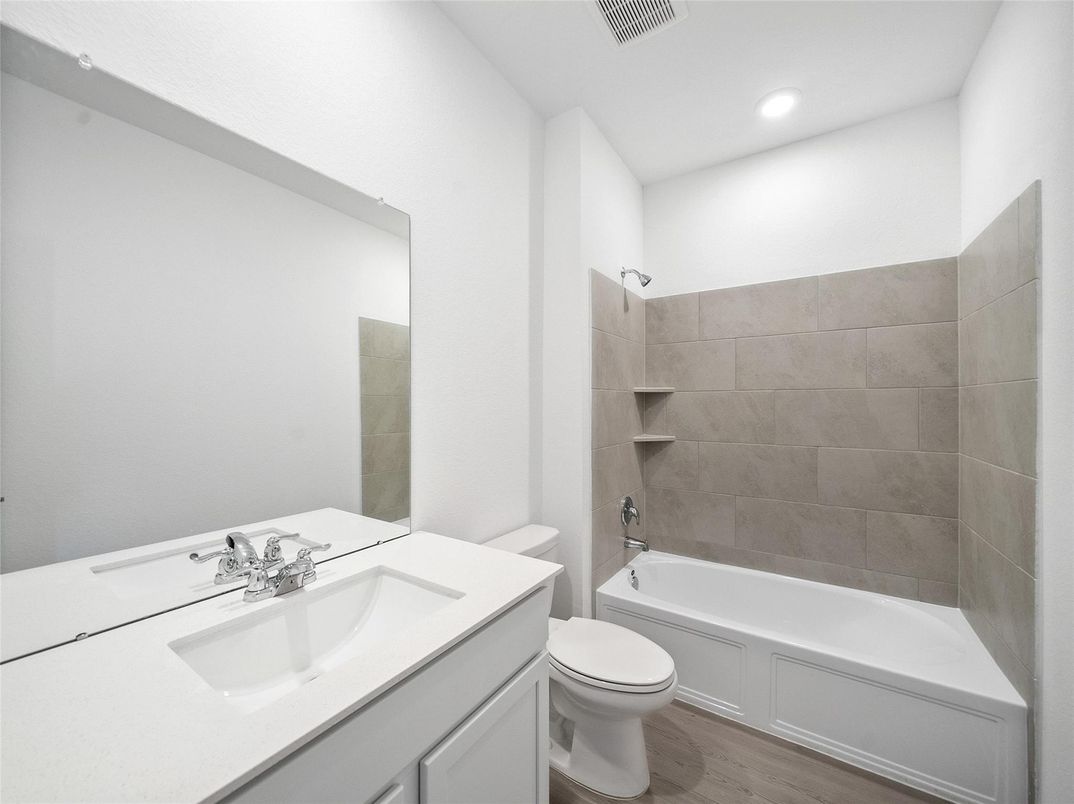 Bathroom, Dual Sink Vanities, Interior, Recessed Lighting, Wood Texture Flooring