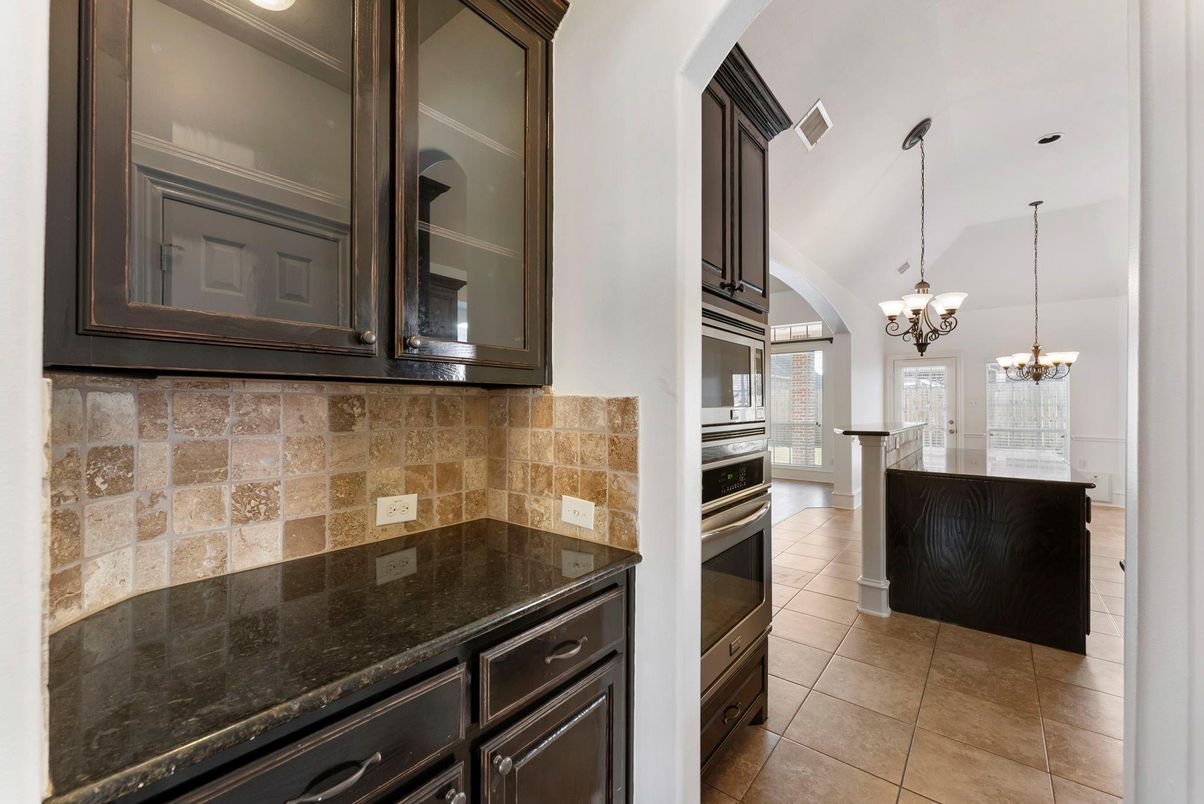 Chandelier, Interior, Kitchen, Pendant Lights, Stainless Steel Appliances, Stone Walls