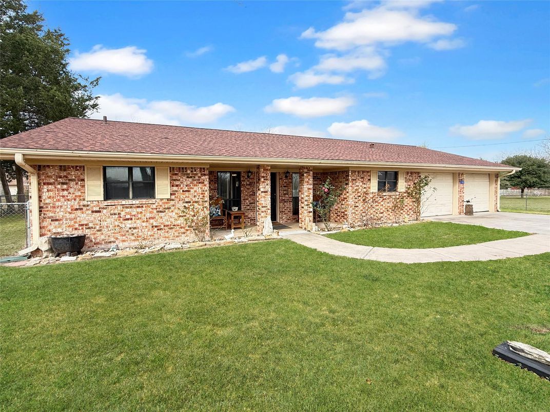 Attached, Backyard, Exterior, Facade, Brick Facade, Ranch