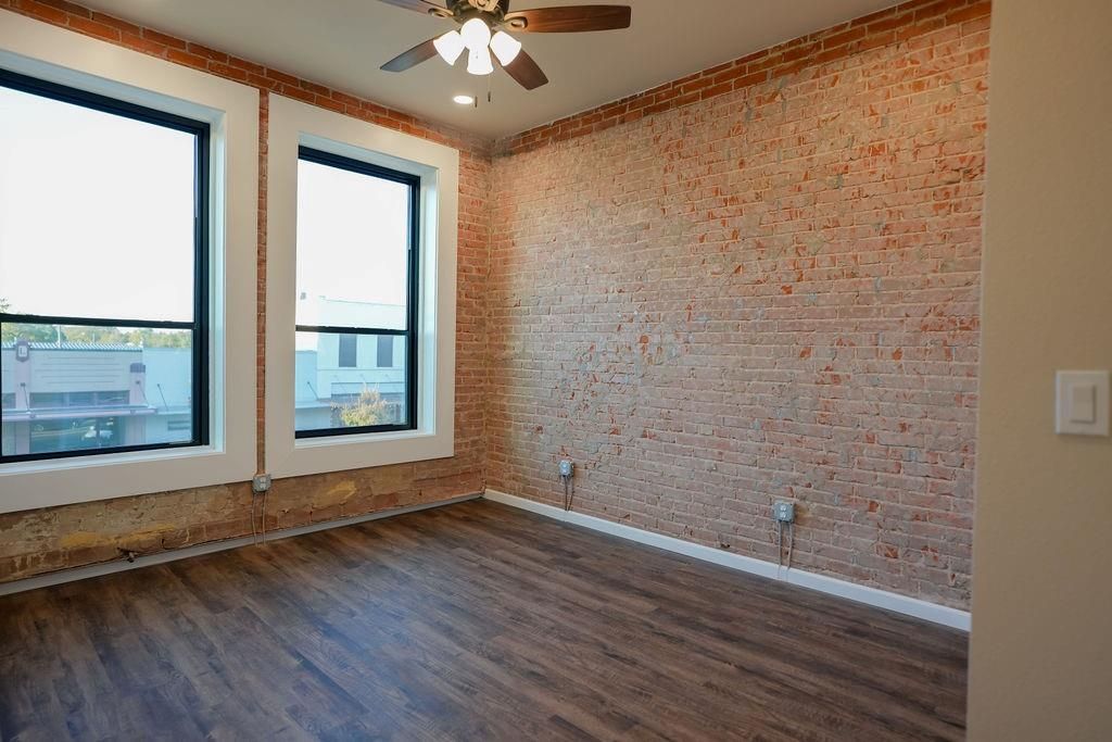 Empty room, Interior, Recessed Lighting, Stone Walls, Wood Texture Flooring