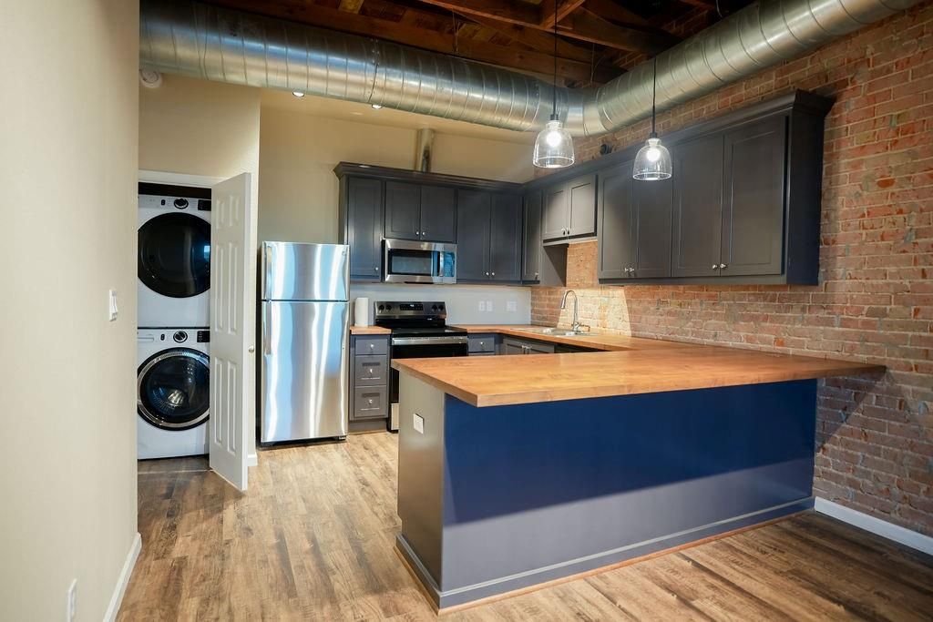 Interior, Kitchen, Pendant Lights, Stone Walls, Washer, Wood Texture Flooring