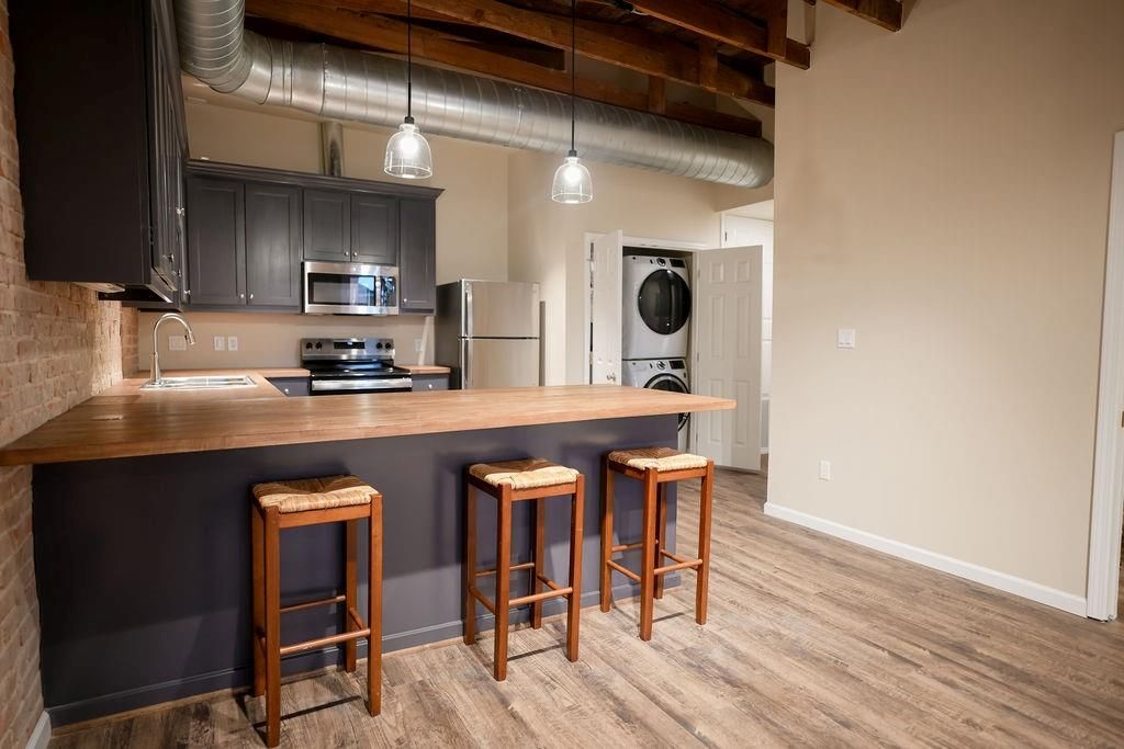 Interior, Kitchen, Pendant Lights, Stainless Steel Appliances, Washer, Wood Texture Flooring