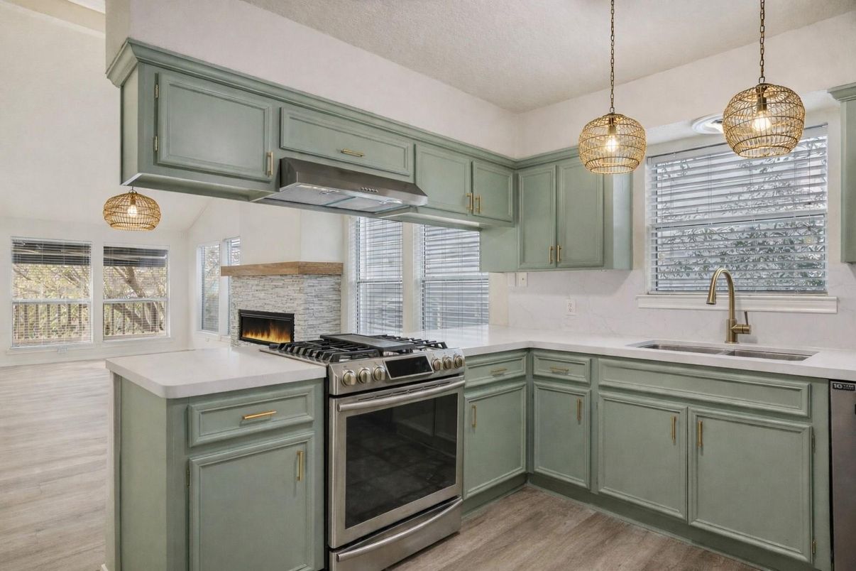 Fireplace, Interior, Kitchen, Pendant Lights, Stainless Steel Appliances, Wood Texture Flooring