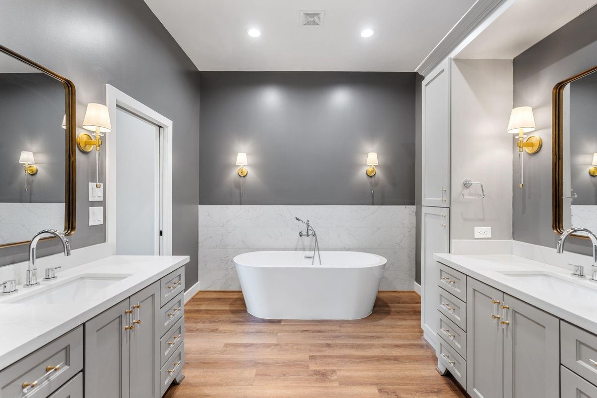 Bathroom, Dual Sink Vanities, Free Standing Baths, Interior, Marble Walls, Recessed Lighting, Wood Texture Flooring