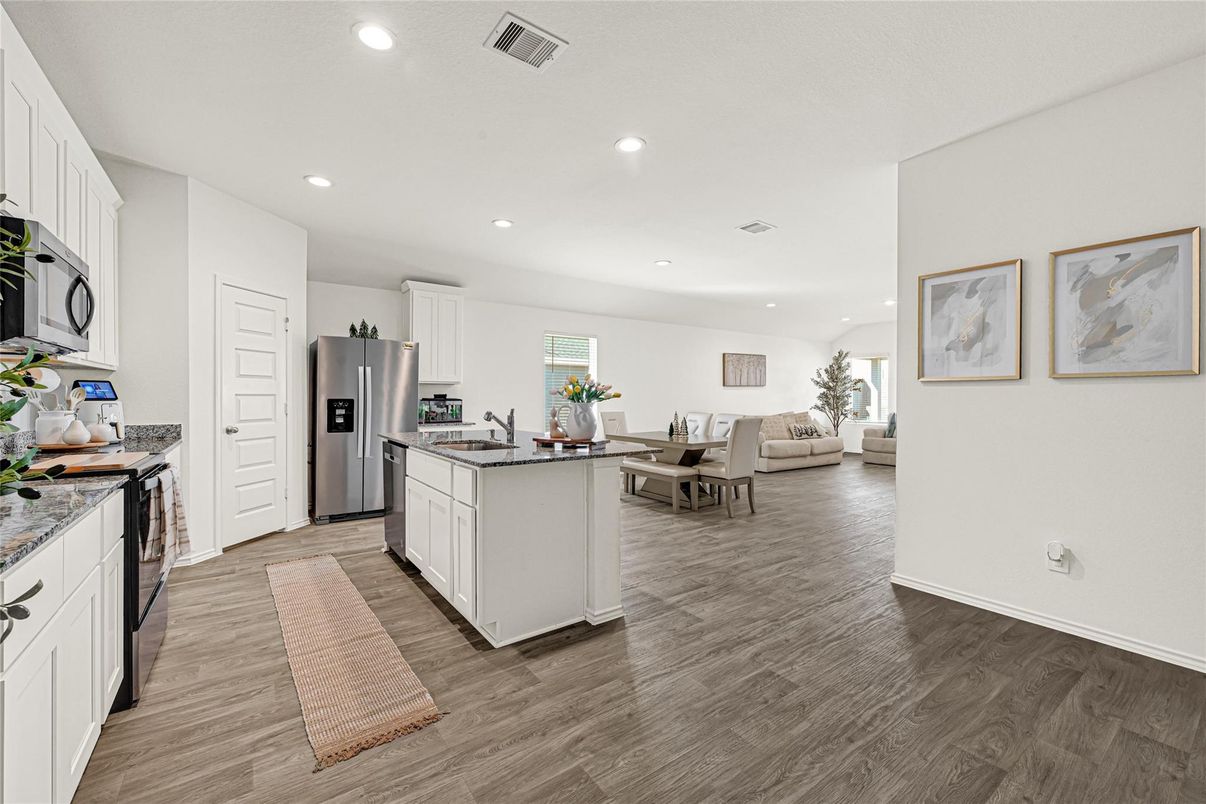 Dining room, Interior, Kitchen, Recessed Lighting, Stainless Steel Appliances, Wood Texture Flooring