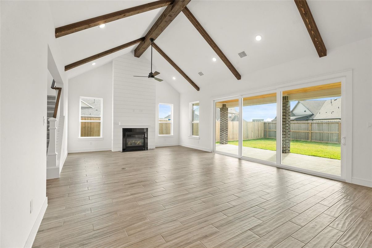 Empty room, Fireplace, Interior, Recessed Lighting, Wooden Beams, Wood Texture Flooring