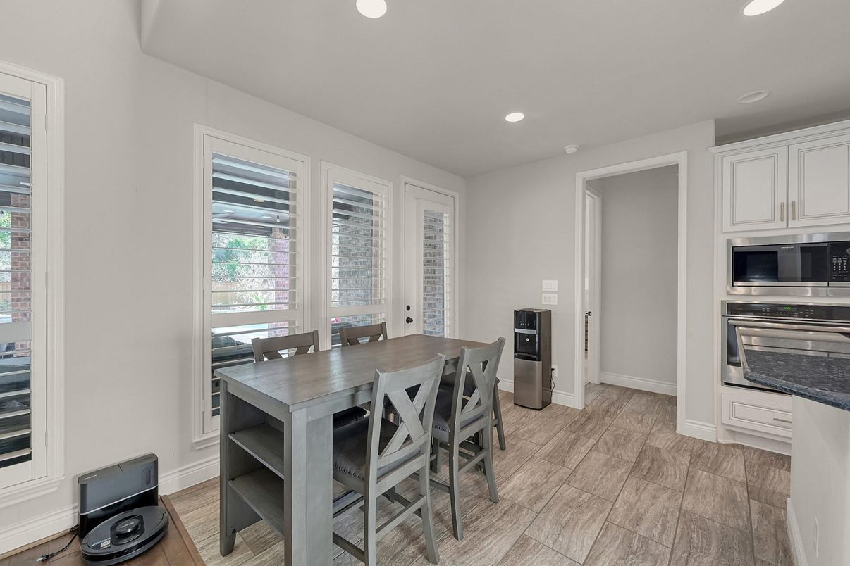 Dining room, Interior, Kitchen, Recessed Lighting, Stainless Steel Appliances, Wood Texture Flooring