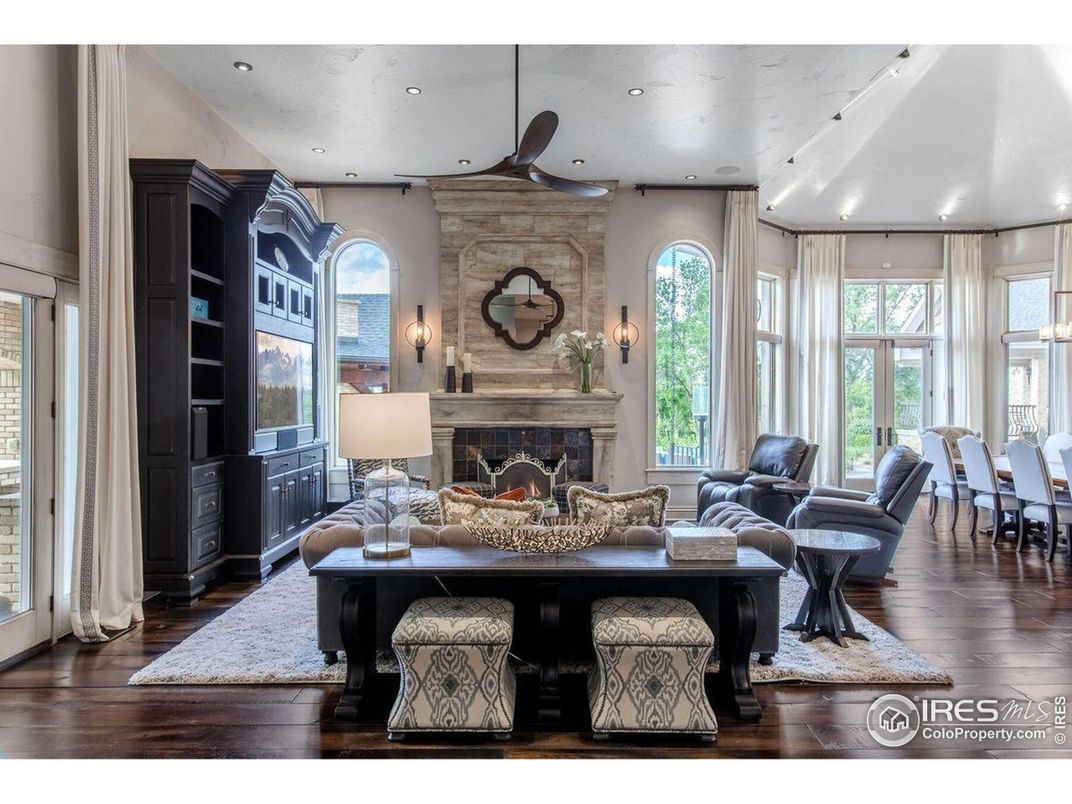 Dining room, Fireplace, Interior, Living room, Recessed Lighting, Wood Texture Flooring