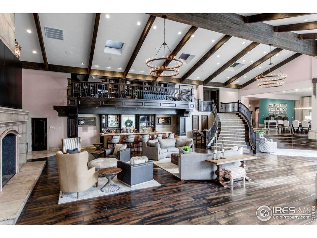 Chandelier, Dining room, Fireplace, Interior, Living room, Pendant Lights, Recessed Lighting, Wooden Beams, Wood Texture Flooring