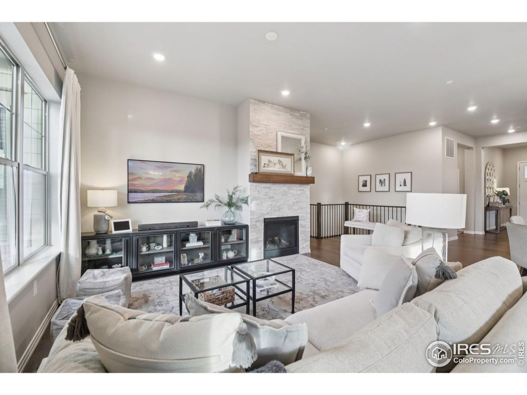 Fireplace, Interior, Living room, Recessed Lighting, Stone Walls, Wood Texture Flooring