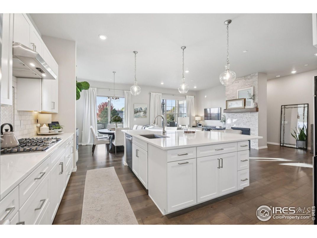 Dining room, Interior, Kitchen, Pendant Lights, Recessed Lighting, Stainless Steel Appliances, Wood Texture Flooring
