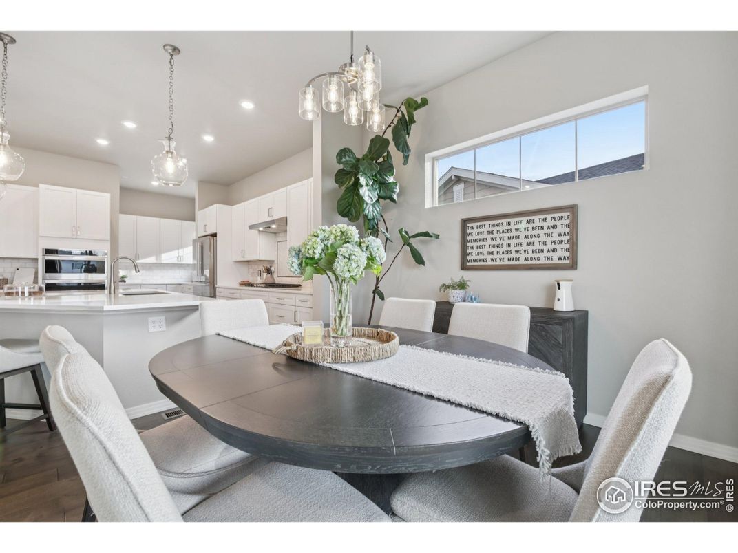 Dining room, Interior, Kitchen, Pendant Lights, Recessed Lighting, Stainless Steel Appliances, Wood Texture Flooring