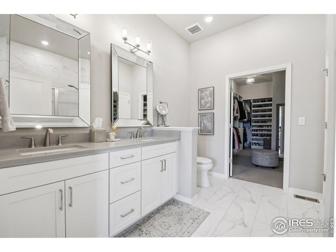 Bathroom, Dual Sink Vanities, Interior, Marble, Recessed Lighting, Walk-in Closets
