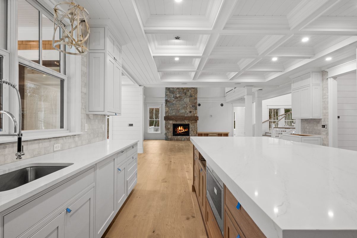 Fireplace, Interior, Kitchen, Recessed Lighting, Stone Walls, Wood Texture Flooring