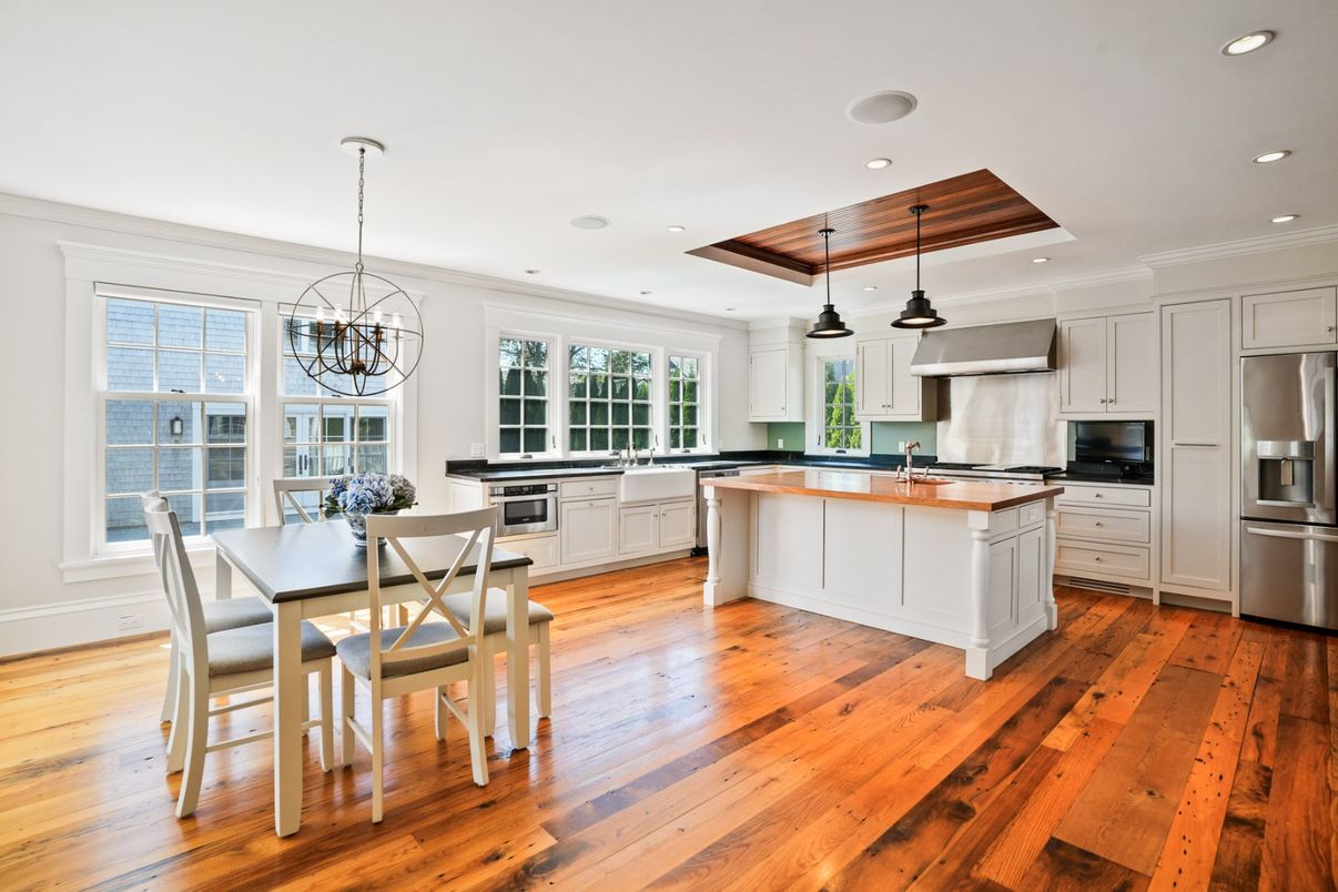 Chandelier, Dining room, Interior, Kitchen, Pendant Lights, Recessed Lighting, Stainless Steel Appliances, Wooden Beams, Wooden Ceilings, Wood Texture Flooring