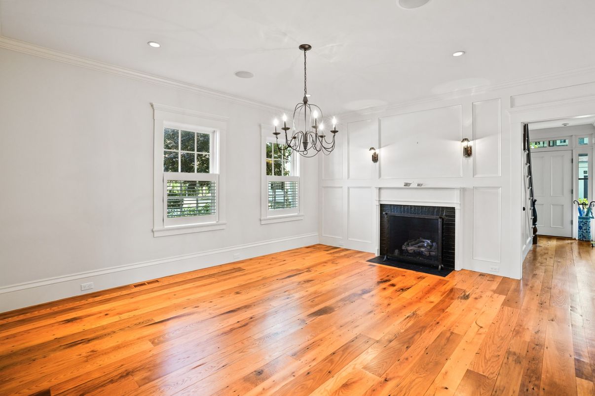 Chandelier, Empty room, Fireplace, Interior, Recessed Lighting, Wood Texture Flooring