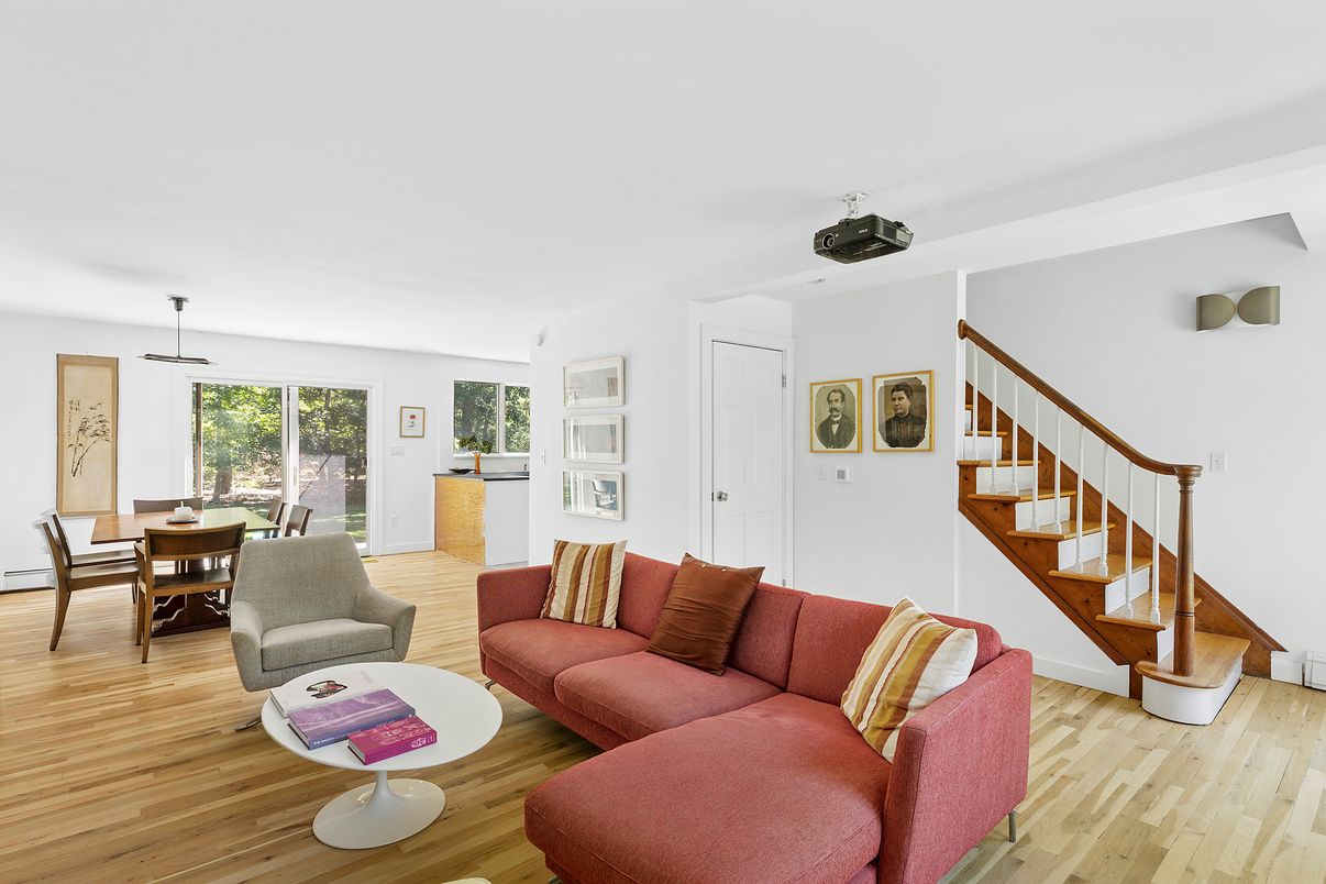 Dining room, Fireplace, Interior, Pendant Lights, Stone Walls, Wood Texture Flooring